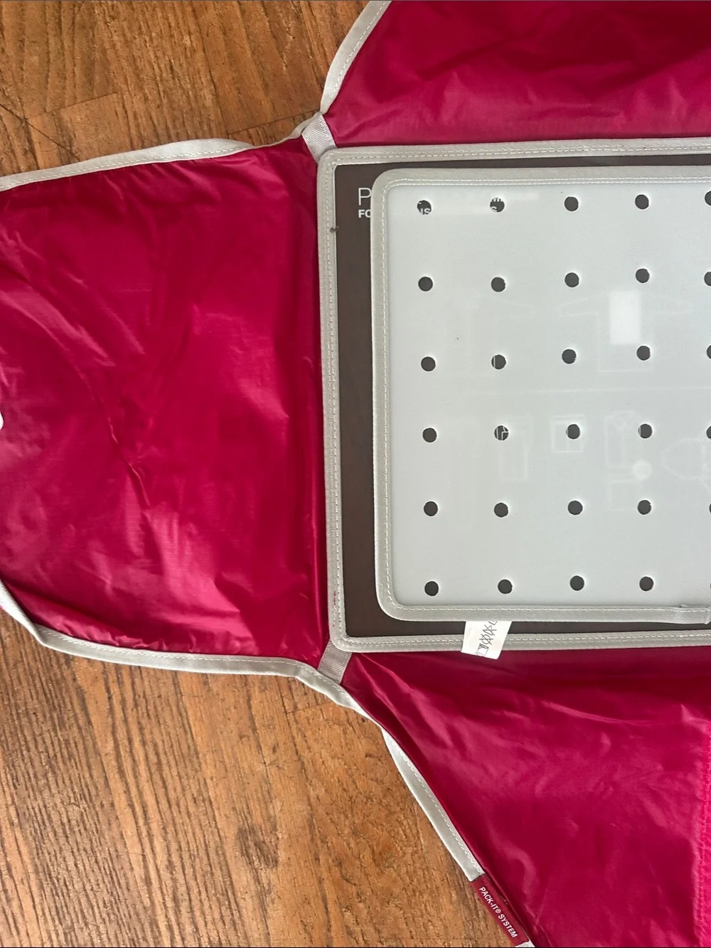 Red Travel Packing Folder with Gray Interior Panel